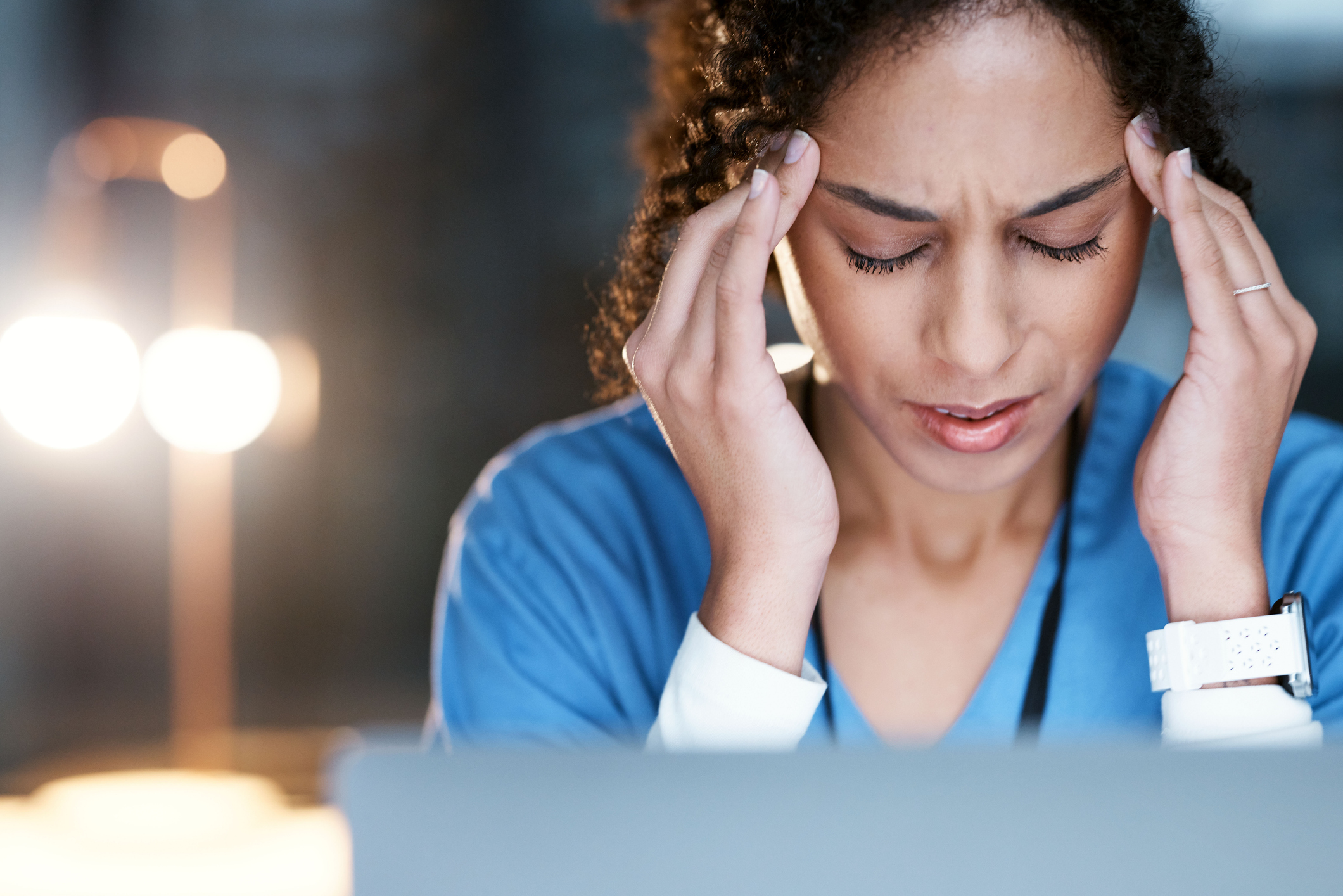 Night, stress and headache with doctor at laptop for medical, thinking and deadline review. Burnout, accountability and mental health with black woman for healthcare, medicine and science research