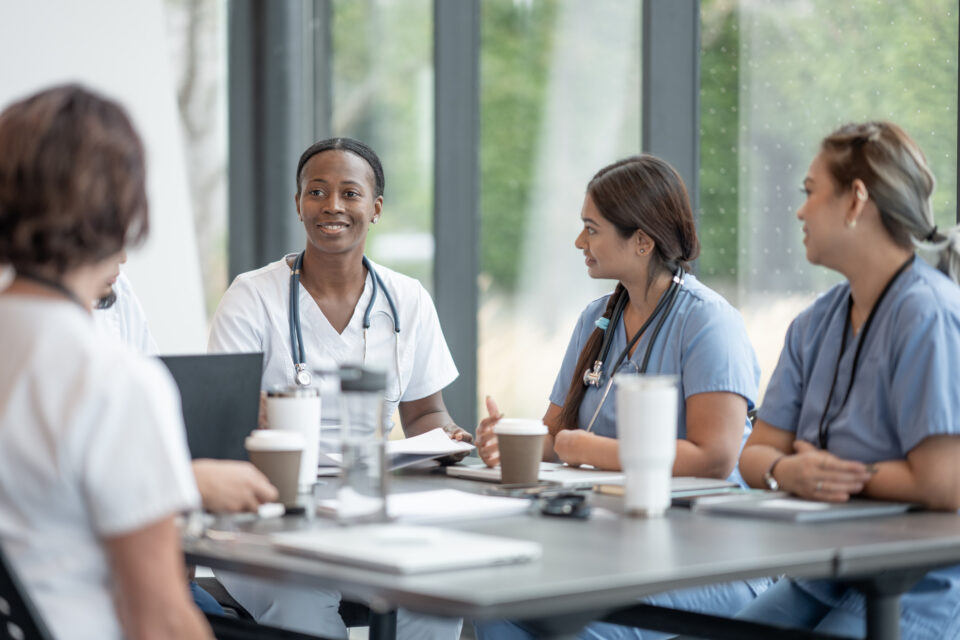 Medical professionals discussing in meeting